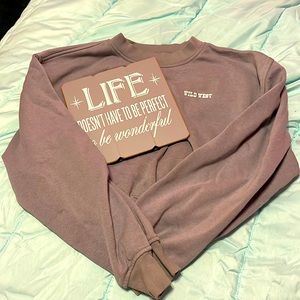 I am selling a crop top that is gray